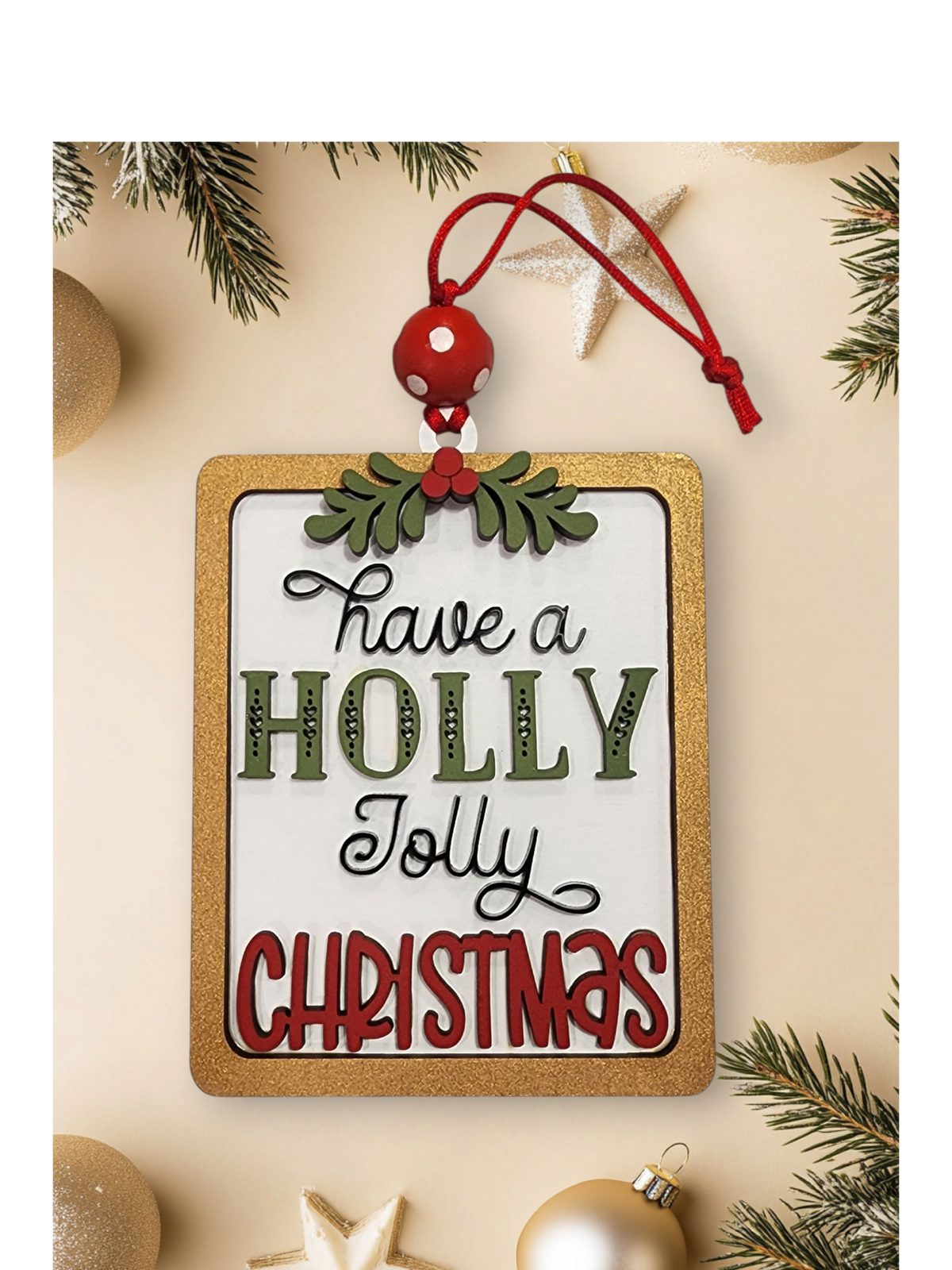 Layered wood Holly Jolly Christmas ornament with holly accents and red polka dot bead
