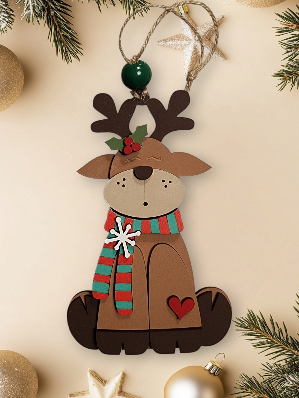 Festive layered wood reindeer Christmas ornament with striped scarf and holly